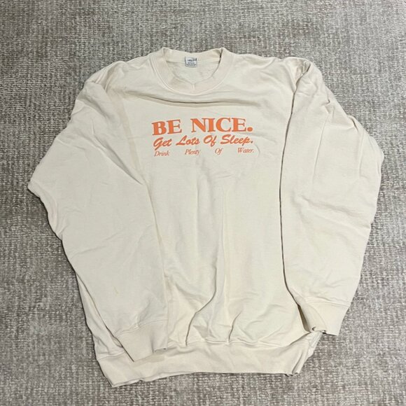 SPORTY & RICH BE NICE CREWNECK MILK/GUAVA - Picture 1 of 4
